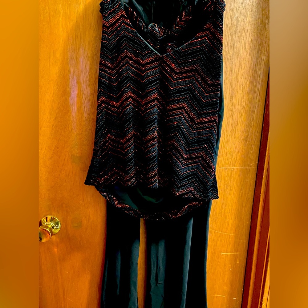 pant suit. Form fitting looks amazing on you. outfit is good for holiday.